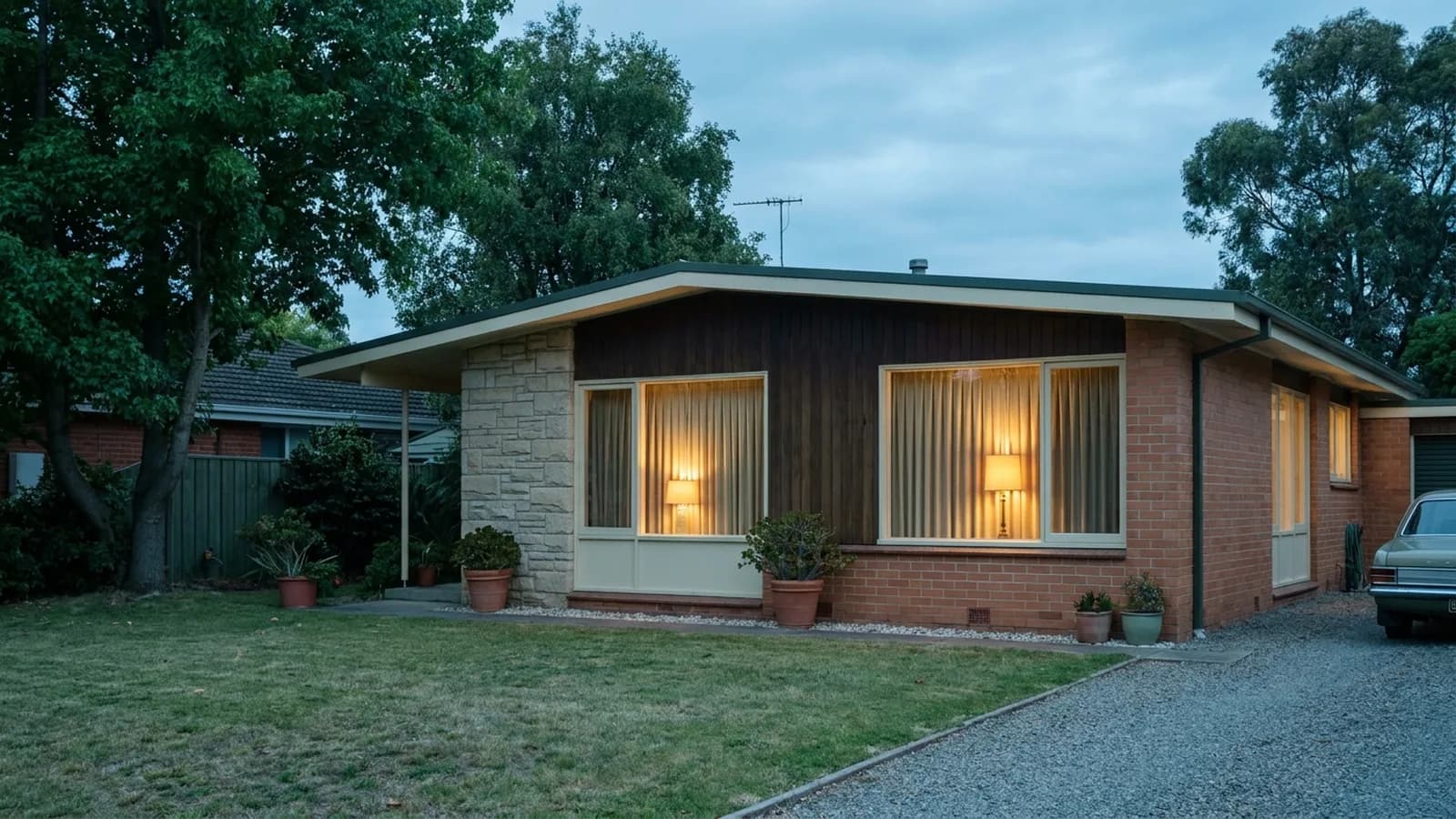 A mid-century family home in the late afternoon, curtains drawn, quiet and still